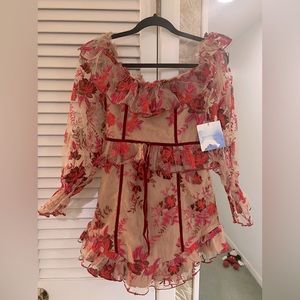 REVOLVE mini dress, off the shoulder and a ruffled hem.  Super sleek look